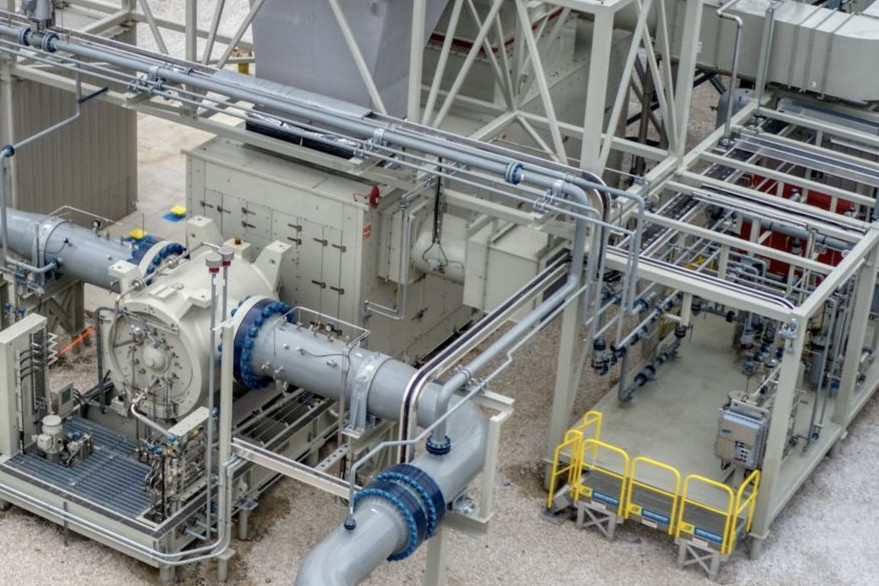 Gas turbine driven compressor package at a compressor station